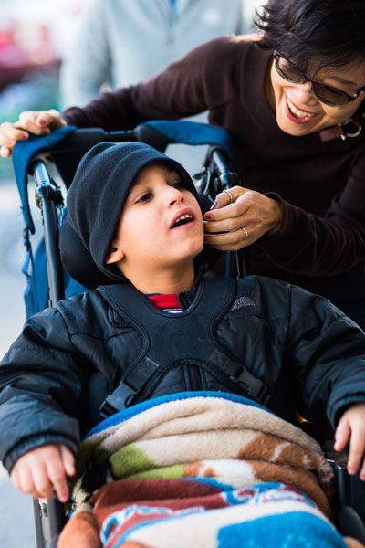 A child in a wheelchair